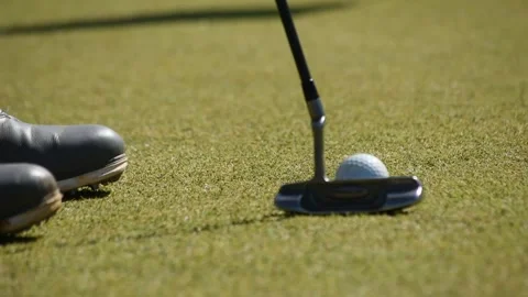 Kicking a golf ball on the course Stock Footage 146484063