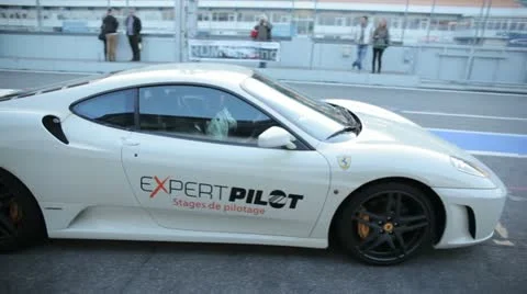 Kickstart of a white Ferrari Stock-Footage 20676024