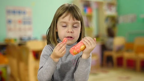 The kid 4-5 years old laughs eager. A child is showing a thumbs up. Stock Footage 96842554