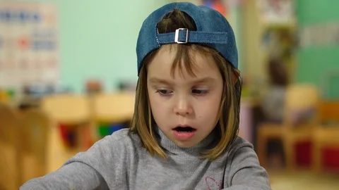 The kid is 4-5 years old in the playroom of the kindergarten. Stock Footage 96842577
