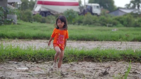 Kid alone in the rice fields Stock Footage 75886494