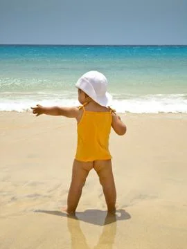 Kid back on the beach Stock Photos
