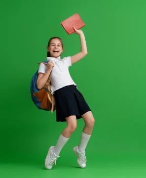 Kid with backpack on color background. Foto stock