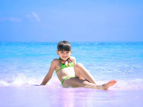 Kid on the beach Stock Photos