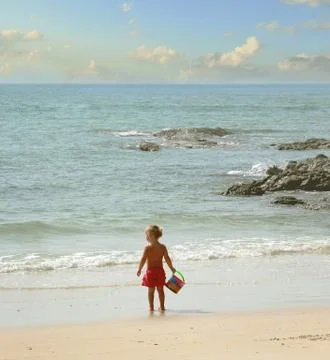 Kid on the beach Stock Photos