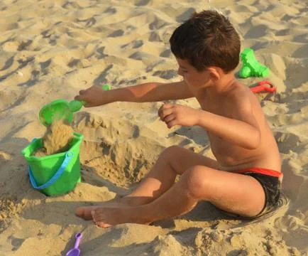 Kid on the beach Stock Photos