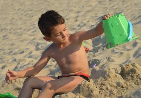 Kid on the beach Stock Photos