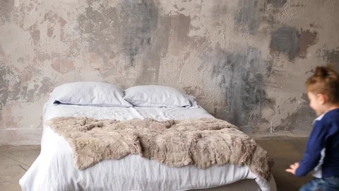 Kid on a bed Video stock 89333388