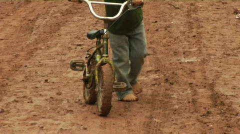Kid Bicycle mud Stock Footage 378707