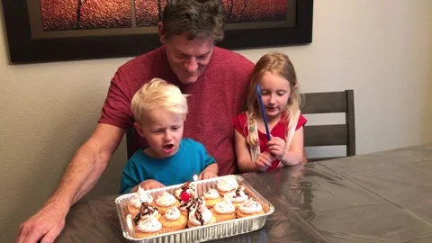Kid Blows Out Dad's Candle, Colorado, USA Video stock 337602763