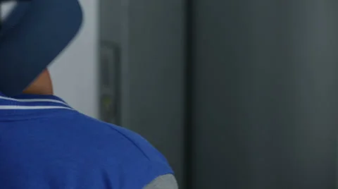 Kid with a blue hat enters an elevator 스톡 동영상 34649254