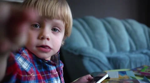 Kid boy and mobile cell phone Stock Footage 46899579