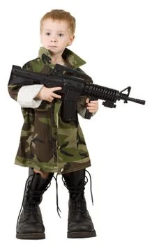 Kid Boy with automatic weapon, Little Child in military boots and camouflage Stock Photos