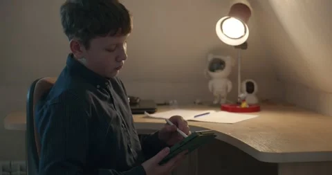 Kid Boy Draw with Stylus Pen on Tablet. 4K 10-bit Stock Footage 339065885