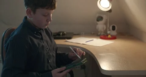 Kid Boy Draw with Stylus Pen on Tablet. 4K 10-bit Stock Footage 339065927