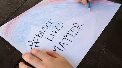 Kid boy paint drawing for support black lives matter protest in usa,no racism Stock Footage 132268008