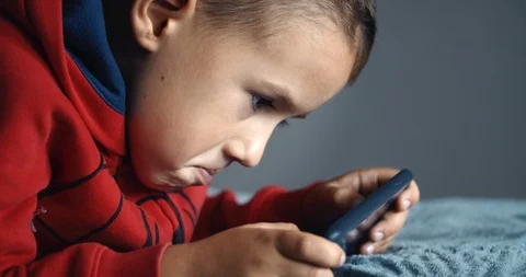Kid Boy Plays Videogame Видео 116593196