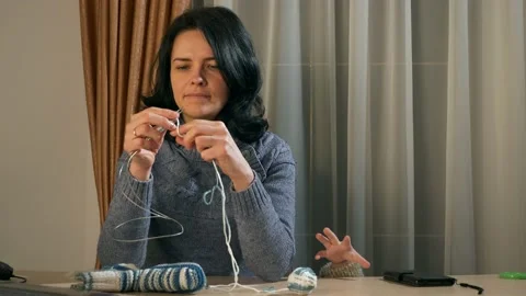Kid Boy Under Table Child Hand Grab Take Smartphone Mother Knit Knitting Needles Video stock 167819620