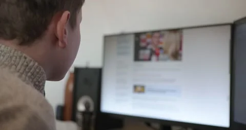 Kid Boy Use Desktop Computer for Study Typing and Reading. 4K 10-bit Stock Footage 339065531