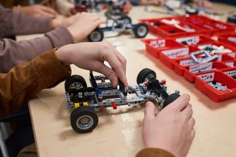 Kid Building Robot in Class Close Up Fotos de archivo