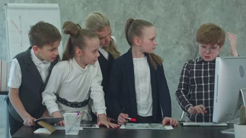 Kid business team working in the office together with computer Stock Footage