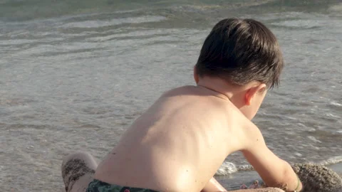 Kid child boy having fun on sands beach seashore Видео 221251489