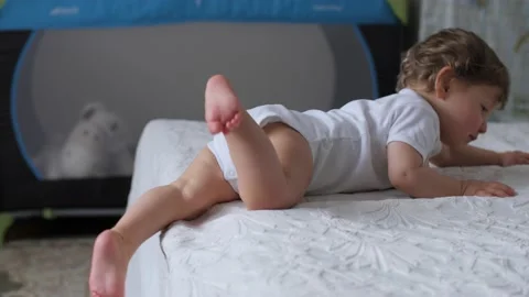 The kid climbs out of bed Video stock 102441707