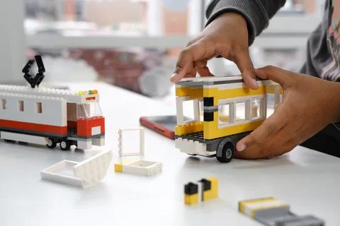 Kid constructing transport on STEM lessons Stock Photos