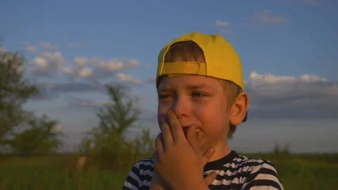 Kid is crying. close-up of a child face in tears. Domestic violence concept. Kid Stock-Footage 145187237