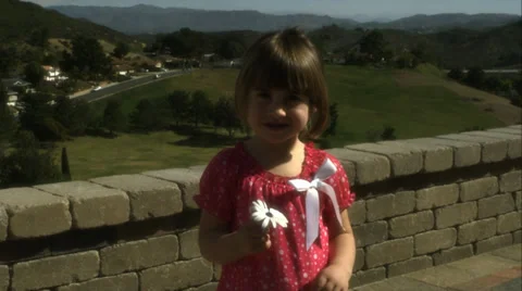 Kid &amp; Daisy Stock Footage 32366473