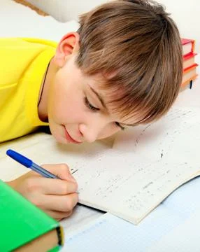 Kid doing Homework Foto stock