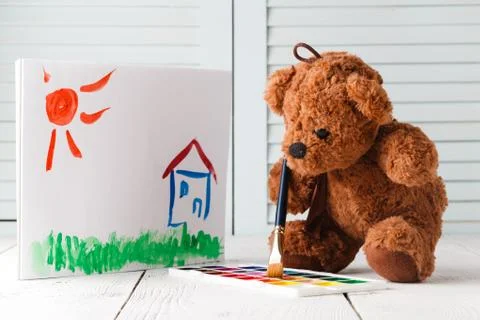 Kid draw learning, teddy with paints Stock Photos