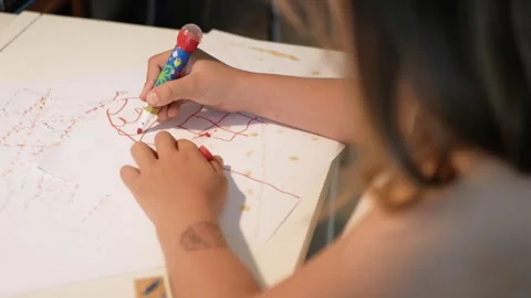 Kid drawing a house on the paper Video stock 263140002