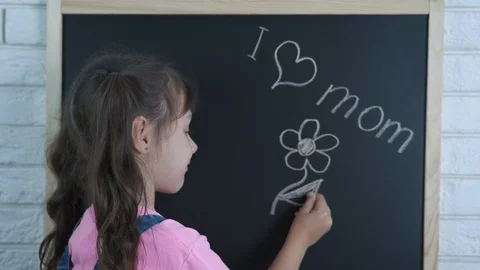 Kid drawing for mom. | Stock Video | Pond5