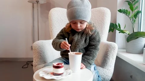 Kid Drinking Hot Chocolate in Cafe Cozy Lifestyle Scene Видео 332656657