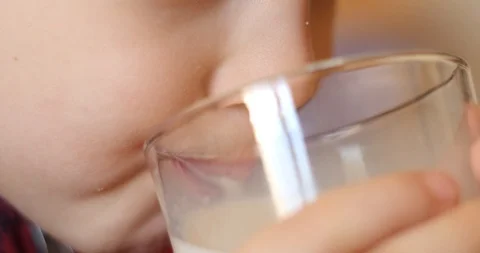Kid drinking milk from the glass 스톡 동영상 126209640
