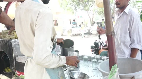 Kid drinking sugar cane juice 스톡 동영상 49344644
