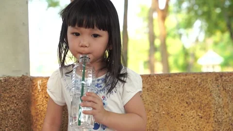 Kid drinking water Slomo1 Stock Footage 131871632