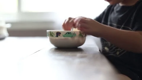 Kid eating breakfast, video Stockbeeldmateriaal 79284382