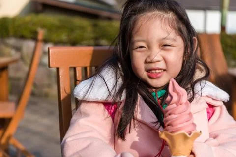 Kid Eating Ice Cream Stock Photos