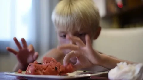 Kid eating watermelon. Stock Footage 137675979