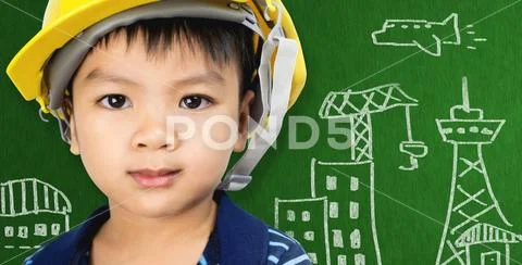 Kid with Engineering City building concept on black board Stock Photos