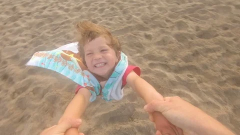 Kid Enjoys being spin by his dad Stock-Footage 130096591