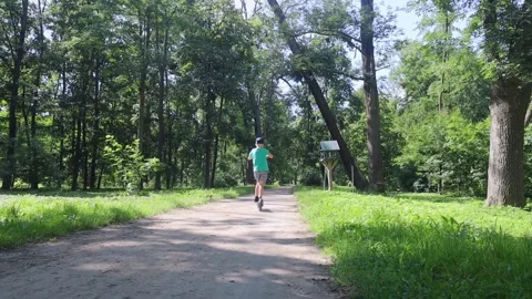 Kid fall when riding an electric scooter. Riding an e-scooter without protective Video stock 247360285