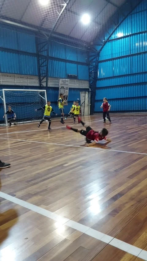 Kid Falls Backward While Making a Free Kick, Curitiba, Parana, Brazil - 28 Nov 2 Vídeo Stock 258846891
