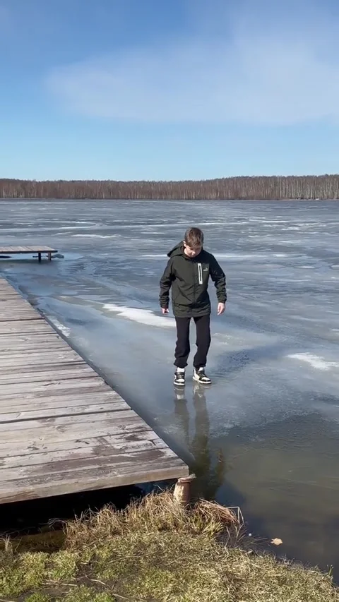 Kid Falls Through Melting Ice, Lake Perekhanovo, Vladimir Oblast, Russia - 04 Ap Stock Footage 332313142