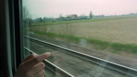 Kid finger on the train window Stock Footage 87745507