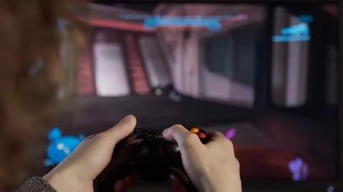 Kid With Game Console Playing Video Game Vídeos de archivo 106379226