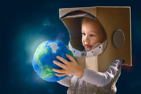 Kid with globe. Stock Photos