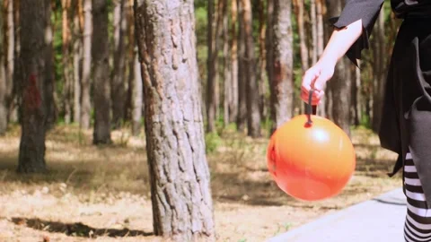 Kid going trick or treating. Low section shot of child in festive Halloween cost Stock Footage 281103215